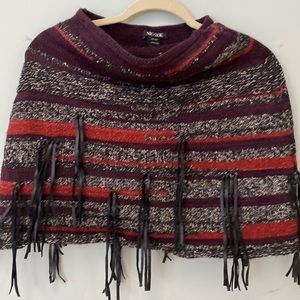 Nic snd Zoe shrug! Leather fringe details